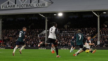 Arsenal's English midfielder #07 Bukayo Saka (2R) has a shot blocked by Fulham's Portuguese midfielder #26 Joao Palhinha (R) during the English Premier League football match between Fulham and Arsenal at Craven Cottage in London on December 31, 2023. (Photo by Adrian DENNIS / AFP) / RESTRICTED TO EDITORIAL USE. No use with unauthorized audio, video, data, fixture lists, club/league logos or 'live' services. Online in-match use limited to 120 images. An additional 40 images may be used in extra time. No video emulation. Social media in-match use limited to 120 images. An additional 40 images may be used in extra time. No use in betting publications, games or single club/league/player publications. / 
