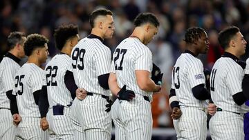 NEW YORK, NEW YORK - OCTOBER 28: Aaron Judge #99 and Giancarlo Stanton #27 of the New York Yankees look on during the national anthem prior to playing the Los Angeles Dodgers during Game Three of the 2024 World Series at Yankee Stadium on October 28, 2024 in the Bronx borough of New York City. Alex Slitz/Getty Images/AFP (Photo by Alex Slitz / GETTY IMAGES NORTH AMERICA / Getty Images via AFP)