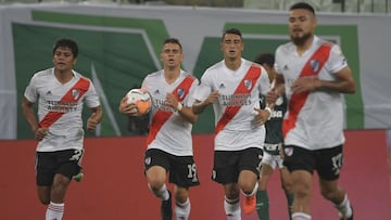 Robert Rojas of Argentina&#039;s River Plate, left, celebrates with teammate Rafael Santos Borre, second from left after scoring his side&#039;s opening goal during a Copa Libertadores semifinal second leg soccer match against Brazil&#039;s Palmeiras at the Allianz Parque stadium in Sao Paulo, Brazil, Tuesday, Jan. 12, 2021 (Nelson Almeida/Pool via AP)