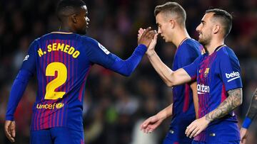 BARCELONA, SPAIN - NOVEMBER 29: Paco Alcacer of FC Barcelona (R) celebrates with his team mate Nelson Semedo after scoring his team's first goal during the Copa del Rey round of 32 second leg match between FC Barcelona and Real Murcia on at Camp Nou on November 29, 2017 in Barcelona, Spain. (Photo by David Ramos/Getty Images)
