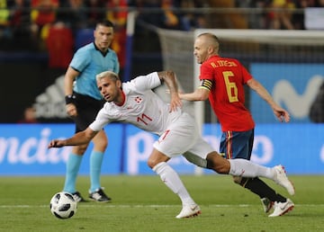 Berhami y Andrés Iniesta.
