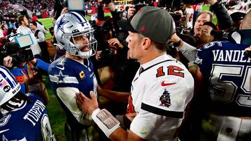 TAMPA, FLORIDA - JANUARY 16: Dak Prescott #4 of the Dallas Cowboys and Tom Brady #12 of the Tampa Bay Buccaneers embrace on the field after their game in the NFC Wild Card playoff game at Raymond James Stadium on January 16, 2023 in Tampa, Florida. Julio Aguilar/Getty Images/AFP (Photo by Julio Aguilar / GETTY IMAGES NORTH AMERICA / Getty Images via AFP)