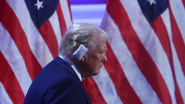 Republican presidential nominee and former U.S. President Donald Trump takes the stage to speak on Day 4 of the Republican National Convention (RNC), at the Fiserv Forum in Milwaukee, Wisconsin, U.S., July 18, 2024. REUTERS/Brian Snyder