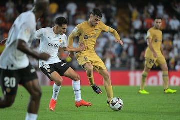 André Almeida y Pedri.