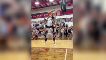 A high school athlete has already made his case for heading to the NBA as he effortlessly jumped over two teammates to make this insane basketball dunk.