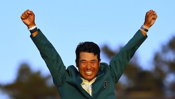 Golf - The Masters - Augusta National Golf Club - Augusta, Georgia, U.S. - April 11, 2021 Japan&#039;s Hideki Matsuyama celebrates with his green jacket after winning The Masters REUTERS/Brian Snyder