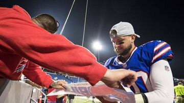 ORCHARD PARK, NY - AUGUST 09: AJ McCarron #10 of the Buffalo Bills signs an autograph after the game against the Carolina Panthers at New Era Field on August 9, 2018 in Orchard Park, New York. Carolina defeats Buffalo in the preseason game 28-23.   Brett Carlsen/Getty Images/AFP
 == FOR NEWSPAPERS, INTERNET, TELCOS &amp; TELEVISION USE ONLY ==