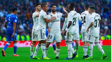 MADRID, SPAIN - DECEMBER 06:  Isco of Real Madrid (22) celebrates after scoring his team&#039;s fourth goal with team mates during the Copa del Rey fourth round match between Real Madrid and Melilla at Estadio Bernabeu on December 6, 2018 in Madrid, Spain