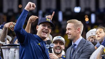 INDIANAPOLIS, INDIANA - DECEMBER 2: Head coach Jim Harbaugh of the Michigan Wolverines celebrates after winning the Big Ten Championship against the Iowa Hawkeyes at Lucas Oil Stadium on December 2, 2023 in Indianapolis, Indiana.   Michael Hickey/Getty Images/AFP (Photo by Michael Hickey / GETTY IMAGES NORTH AMERICA / Getty Images via AFP)