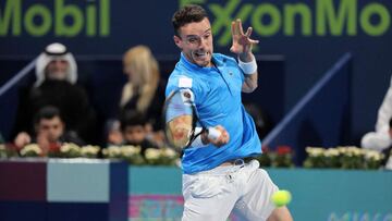 Roberto Bautista Agut of Spain returns the ball to Karen Khachanov of Russia during the tennis semi-final match of the 2022 ATP Qatar Open in Doha on February 18, 2022. (Photo by KARIM JAAFAR / AFP)