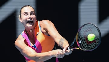 Belarus' Aryna Sabalenka hits a return to USA's Iva Jovic during their women's singles quarter-final match on day ten of the Australian Open tennis tournament in Melbourne on January 27, 2026. (Photo by IZHAR KHAN / AFP) / -- IMAGE RESTRICTED TO EDITORIAL USE - STRICTLY NO COMMERCIAL USE --