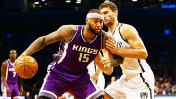 Nov 27, 2016; Brooklyn, NY, USA; Sacramento Kings center center DeMarcus Cousins (15) dribbles the ball as Brooklyn Nets center Brook Lopez (11) defends during the first half at Barclays Center. Mandatory Credit: Andy Marlin-USA TODAY Sports