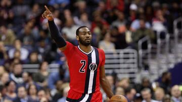 WASHINGTON, DC - JANUARY 24: John Wall #2 of the Washington Wizards brings the ball up the floor against the Boston Celtics at Verizon Center on January 24, 2017 in Washington, DC. NOTE TO USER: User expressly acknowledges and agrees that, by downloading and or using this photograph, User is consenting to the terms and conditions of the Getty Images License Agreement. Rob Carr/Getty Images/AFP
== FOR NEWSPAPERS, INTERNET, TELCOS & TELEVISION USE ONLY ==