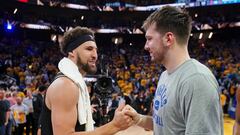 Dallas Mavericks guard Luka Doncic with Golden State Warriors guard Klay Thompson after game five of the 2022 western conference finals at Chase Center.