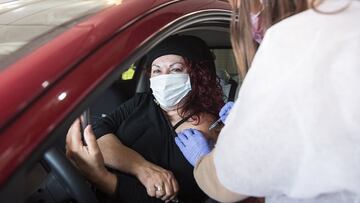 HAIFA, ISRAEL - DECEMBER 31: Israelis receive the coronavirus vaccine at a drive in Covid-19 vaccination centre on December 31, 2020 in Haifa, Israel. Israeli health officials are currently administering the first dose of the Pfizer/BioNTech vaccine at a 