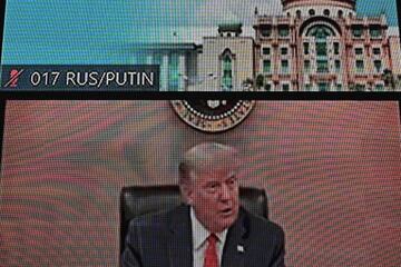 On screen | US President Donald Trump is pictured below the empty space where Russian President Vladimir Putin was set to join, during the online Asia-Pacific Economic Cooperation (APEC) leaders' summit in Kuala Lumpur on November 20, 2020.