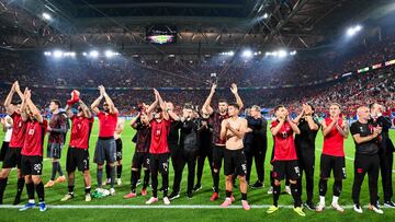 (From L) Albania's midfielder #14 Qazim Laci, Albania's midfielder #08 Klaus Gjasula, Albania's forward #16 Medon Berisha and Albania's forward #15 Taulant Seferi acknowledge the public at the end of the UEFA Euro 2024 Group B football match between Albania and Spain at the Duesseldorf Arena in Duesseldorf on June 24, 2024. (Photo by Alberto PIZZOLI / AFP)