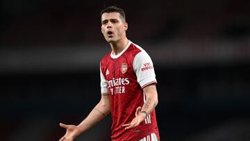 LONDON, ENGLAND - FEBRUARY 21: Granit Xhaka of Arsenal reacts during the Premier League match between Arsenal and Manchester City at Emirates Stadium on February 21, 2021 in London, England. Sporting stadiums around the UK remain under strict restriction