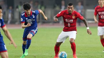 Guangzhou allow Paulinho to travel to Barcelona to complete move