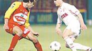 <b>LÍDERES</B>. Rothen, a la derecha, uno de los más destacados del Mónaco.