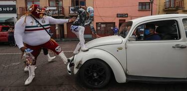 Lucha libre para concienciar del uso de mascarillas