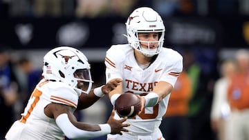 ARLINGTON, TX - DECEMBER 2: Quarterback Arch Manning #16 of the Texas Longhorns