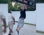 Video: Check out this driveway basketball dunk that gets ugly
