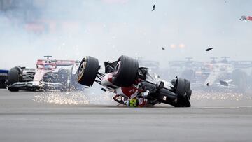 Zhou Guanyu of China Alfa Romeo F1 and George Russell of Great Britain and AMG Petronas F1 crash their cars during the race of the F1 Grand Prix of Great Britain at Silverstone on July 3, 2022 in Northampton, United Kingdom. (Photo by Jose Breton/Pics Action/NurPhoto via Getty Images)