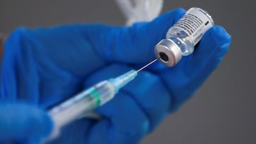 A nurse fills a syringe with a second dose of the Pfizer-BioNTech COVID-19 vaccine, as the coronavirus disease (COVID-19) outbreak continues, at Enfermera Isabel Zendal new pandemic hospital in Madrid, Spain, February 4, 2021. REUTERS/Sergio Perez