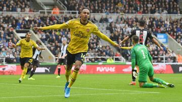 NEWCASTLE UPON TYNE, ENGLAND - AUGUST 11: Pierre-Emerick Aubameyang of Arsenal celebrates after scoring his team's first goal during the Premier League match between Newcastle United and Arsenal FC at St. James Park on August 11, 2019 in Newcastle up