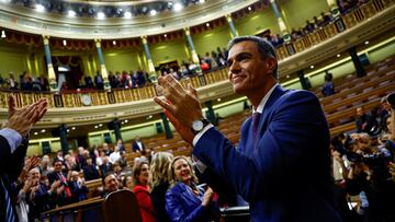 Spain's newly re-appointed Prime Minister Pedro Sanchez applauds after voting at the investiture debate, as Spain's Socialists clinched a new term following a deal with the Catalan separatist Junts party for government support, a pact which involves amnesties for people involved with Catalonia's failed 2017 independence bid, in Madrid, Spain November 16, 2023. REUTERS/Susana Vera