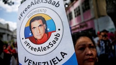 FILE PHOTO: A demonstrator of the "Free Alex Saab" movement participates in a rally in front of the National Assembly of Venezuela demanding the release of Saab, a Colombian businessman with Venezuelan ties who was extradited to the U.S. on a charge of money laundering, in Caracas, Venezuela December 16, 2022. REUTERS/Leonardo Fernandez Viloria/File Photo