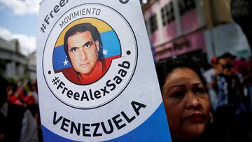 FILE PHOTO: A demonstrator of the "Free Alex Saab" movement participates in a rally in front of the National Assembly of Venezuela demanding the release of Saab, a Colombian businessman with Venezuelan ties who was extradited to the U.S. on a charge of money laundering, in Caracas, Venezuela December 16, 2022. REUTERS/Leonardo Fernandez Viloria/File Photo