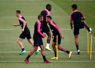 Kylian Mbappe with his PSG team mates during training.
