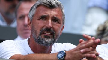 Serbia's Novak Djokovic's coach, Goran Ivanisevic attends Djokovic's men's singles final tennis match against Australia's Nick Kyrgios on the fourteenth day of the 2022 Wimbledon Championships at The All England Tennis Club in Wimbledon, southwest London, on July 10, 2022. (Photo by Adrian DENNIS / AFP) / RESTRICTED TO EDITORIAL USE