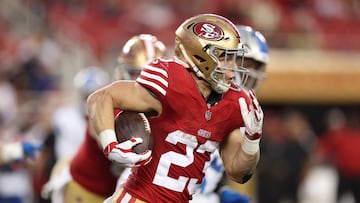 SANTA CLARA, CALIFORNIA - JANUARY 28: Christian McCaffrey #23 of the San Francisco 49ers runs the ball during the third quarter against the Detroit Lions in the NFC Championship Game at Levi's Stadium on January 28, 2024 in Santa Clara, California.   Ezra Shaw/Getty Images/AFP (Photo by EZRA SHAW / GETTY IMAGES NORTH AMERICA / Getty Images via AFP)