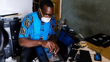 Charles, 42, computer repair, resumes work at his shop as Ghana lifts partial lockdown amid the spread of the coronavirus disease (COVID-19), in Accra, Ghana  April 20, 2020 Picture taken April 20, 2020. REUTERS/Francis Kokoroko