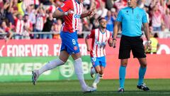 Girona's Ukrainian forward #09 Artem Dovbyk celebrates scoring his team's third goal during the Spanish league football match between Girona FC and UD Almeria at the Montilivi stadium in Girona on October 22, 2023. (Photo by Pau BARRENA / AFP)