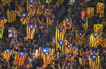 Barcelona fans wave Estelada flags