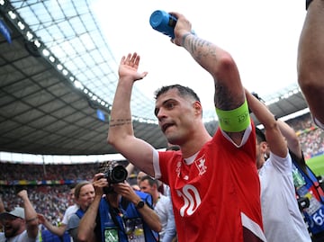 Soccer Football - Euro 2024 - Round of 16 - Switzerland v Italy - Berlin Olympiastadion, Berlin, Germany - June 29, 2024  Switzerland's Granit Xhaka celebrates after the match REUTERS/Annegret Hilse