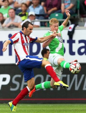 Kevin de Bruyne y Diego Godin.