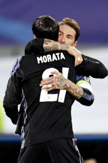 Morata and Sergio Ramos celebrate Real Madrid's qualification for the quarter-finals of the Champions League