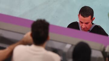 Soccer Football - FIFA World Cup Qatar 2022 - Group D - Denmark v Tunisia - Education City Stadium, Al Rayyan, Qatar - November 22, 2022 Referee Cesar Arturo Ramos Palazuelos checks the VAR monitor REUTERS/Molly Darlington