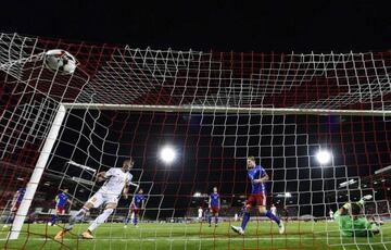 Spain's Iago Aspas (L) reacts after scoring a goal against Liechtenstein's goalkeeper Peter Jehle (R) during the FIFA World Cup 2018 qualification football match between Liechtenstein and Spain