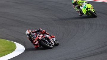 MotoGP - Japanese Grand Prix - Mobility Resort Motegi, Motegi, Japan - September 28, 2025 Aprilia Racing's Marco Bezzecchi and Pertamina Enduro VR46 Racing Team's Franco Morbidelli in action during the MotoGP race REUTERS/Kim Kyung-Hoon