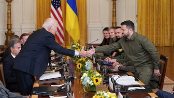 U.S. President Joe Biden and Ukraine President Volodymyr Zelenskiy shake hands across the table during a meeting in the East Room of the White House in Washington, U.S. September 21, 2023. REUTERS/Kevin Lamarque