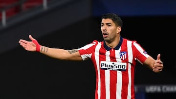 (FILES) In this file picture taken on October 27, 2020 Atletico Madrid's Uruguayan forward Luis Suarez gestures during the UEFA Champions League group A football match between Atletico Madrid and Salzburg, at the Wanda Metropolitano stadium in Madrid
