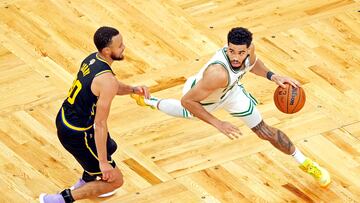 Jun 10, 2022; Boston, Massachusetts, USA; Boston Celtics forward Jayson Tatum (0) drives to the basket against Golden State Warriors guard Stephen Curry (30) during the fourth quarter during game four of the 2022 NBA Finals at TD Garden. Mandatory Credit: Kyle Terada-USA TODAY Sports