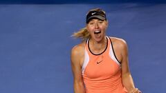 (FILES) This file photo taken on January 24, 2016 shows Russia&#039;s Maria Sharapova celebrating her win against Switzerland&#039;s Belinda Bencic during their women&#039;s singles on day seven of the 2016 of the Australian Open tennis tournament in Melbourne. 
 Russian tennis star Maria Sharapova hailed the reduction of her two-year doping ban on October 4, 2016 as &#039;one of my happiest days&#039;. The Court of Arbitration for Sport (CAS) cut her ban imposed by an independent tribunal appointed by the International Tennis Federation for testing positive for meldonium to 15 months. / AFP PHOTO / PAUL CROCK