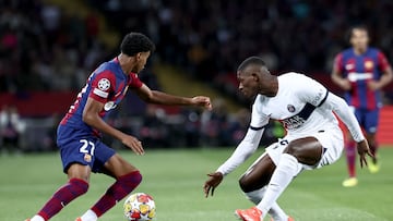 Lamine, ante Nuno Mendes en el Barça-PSG de hace dos temporadas.